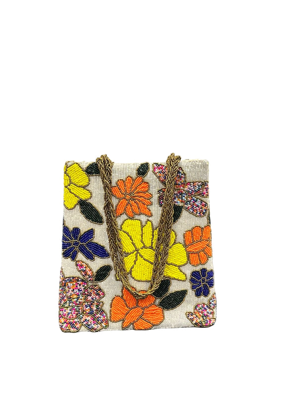 Multi-color handmade bag with a floral beadwork design.