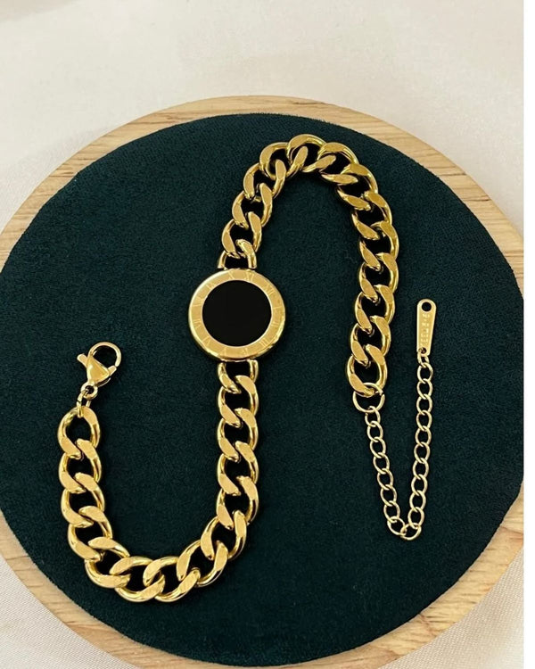 Gold-Tone Chain Bracelet with Black Enamel Center